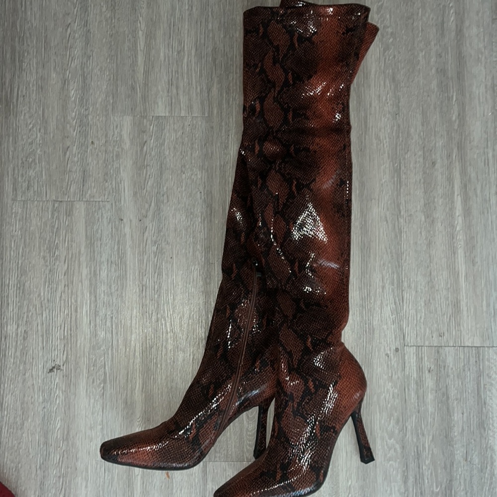 Snake skin thigh high boots